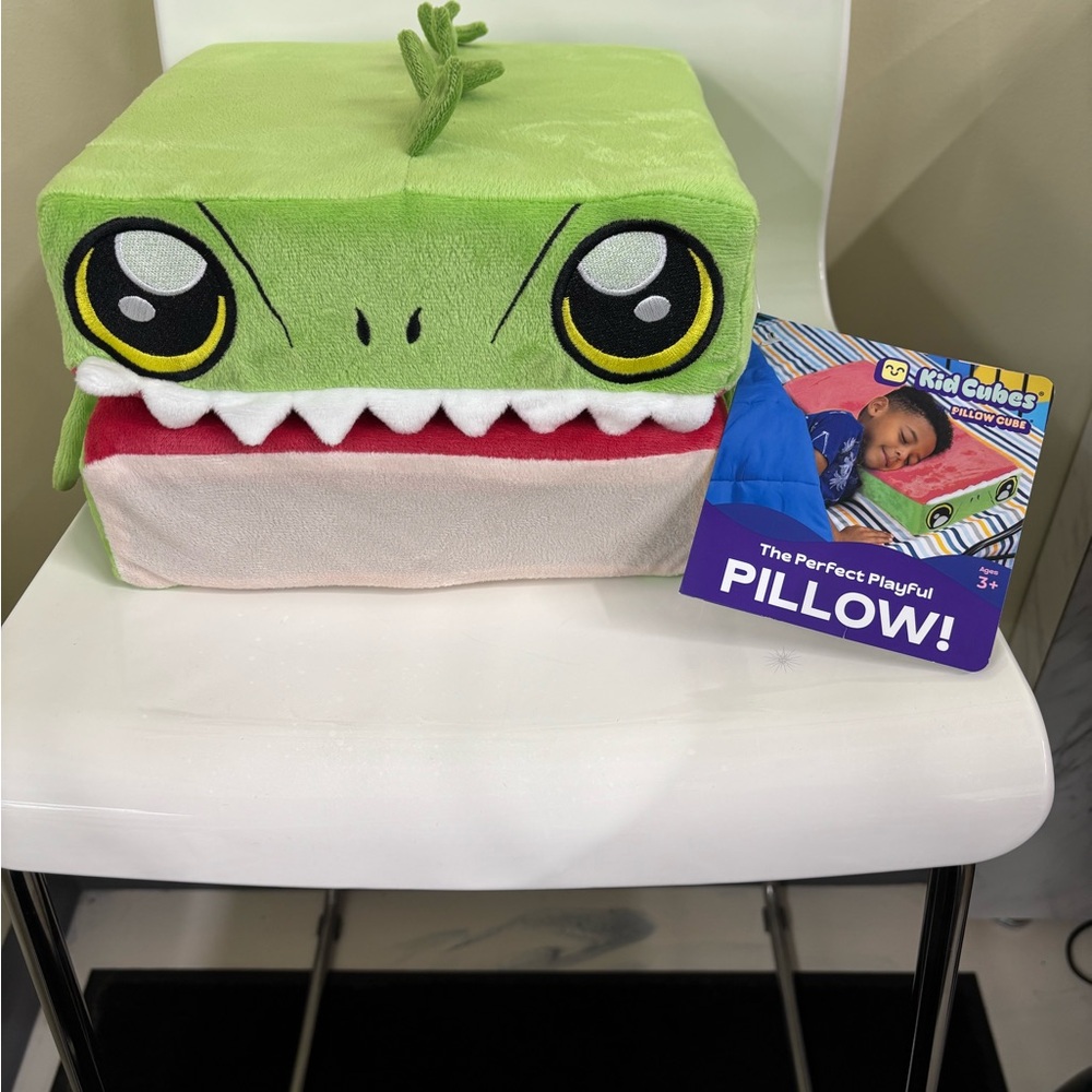 Green and White Plush Stuffed Animal with Leaf Accent